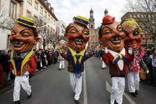 Four "Schwellköpp" at the Rosenmontag parade.